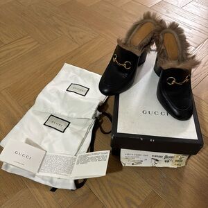 Gucci Black Mules with Brown Fur and Gold Detail
